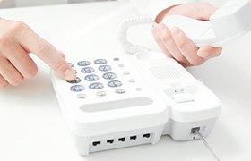 電話で質問をする